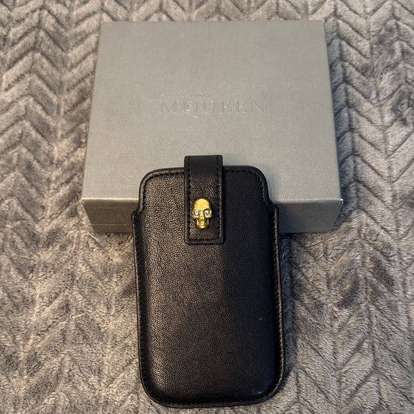 Alexander McQueen Black Phone Holder with Gold Skull Detail